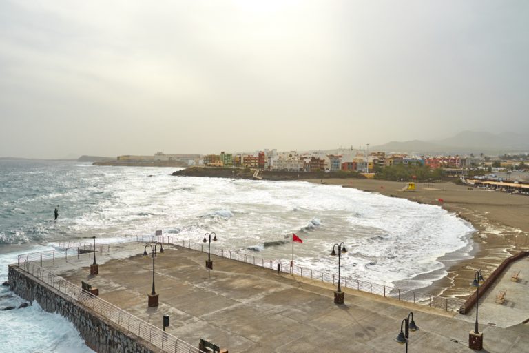 Statue of Greek God Neptune at Melenara Beach on Gran Canaria Island